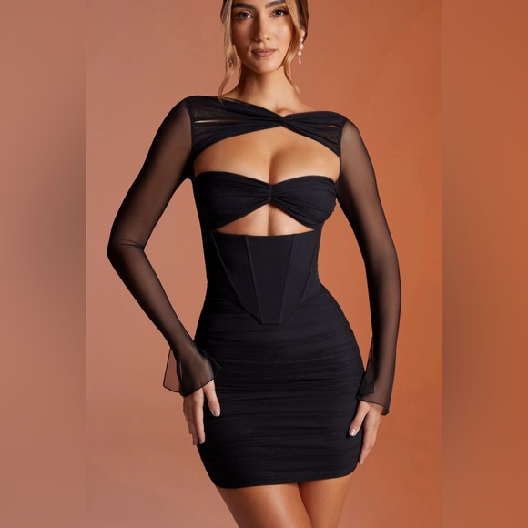 Oh Polly Dresses & Skirts - NWT OH POLLY Long Sleeved Ruched Mini Dress in Black features bow details